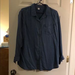 Blue button up blouse.